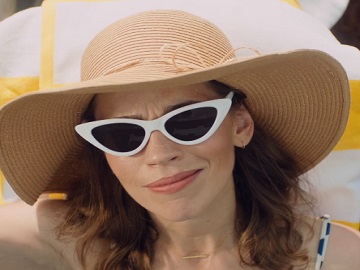 Credit Karma Woman Sunbathing in Convertible Commercial